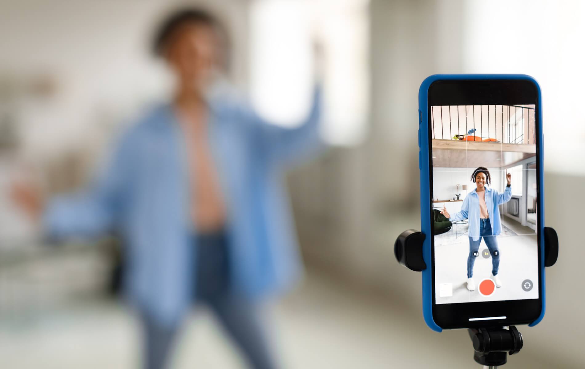 An influencer recording a dance video