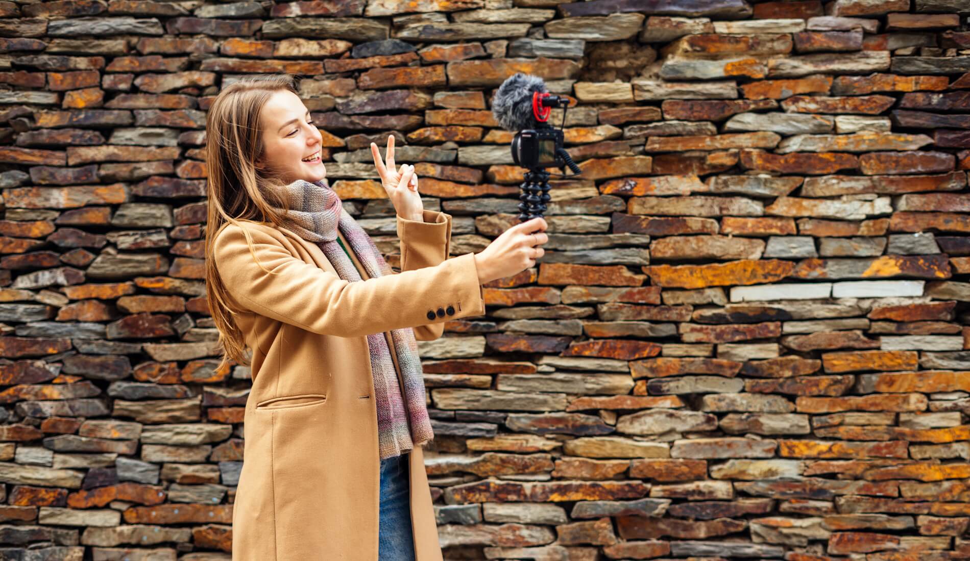 An influencer recording a video outdoors